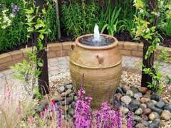 gardening tips to make an oasis with water feature